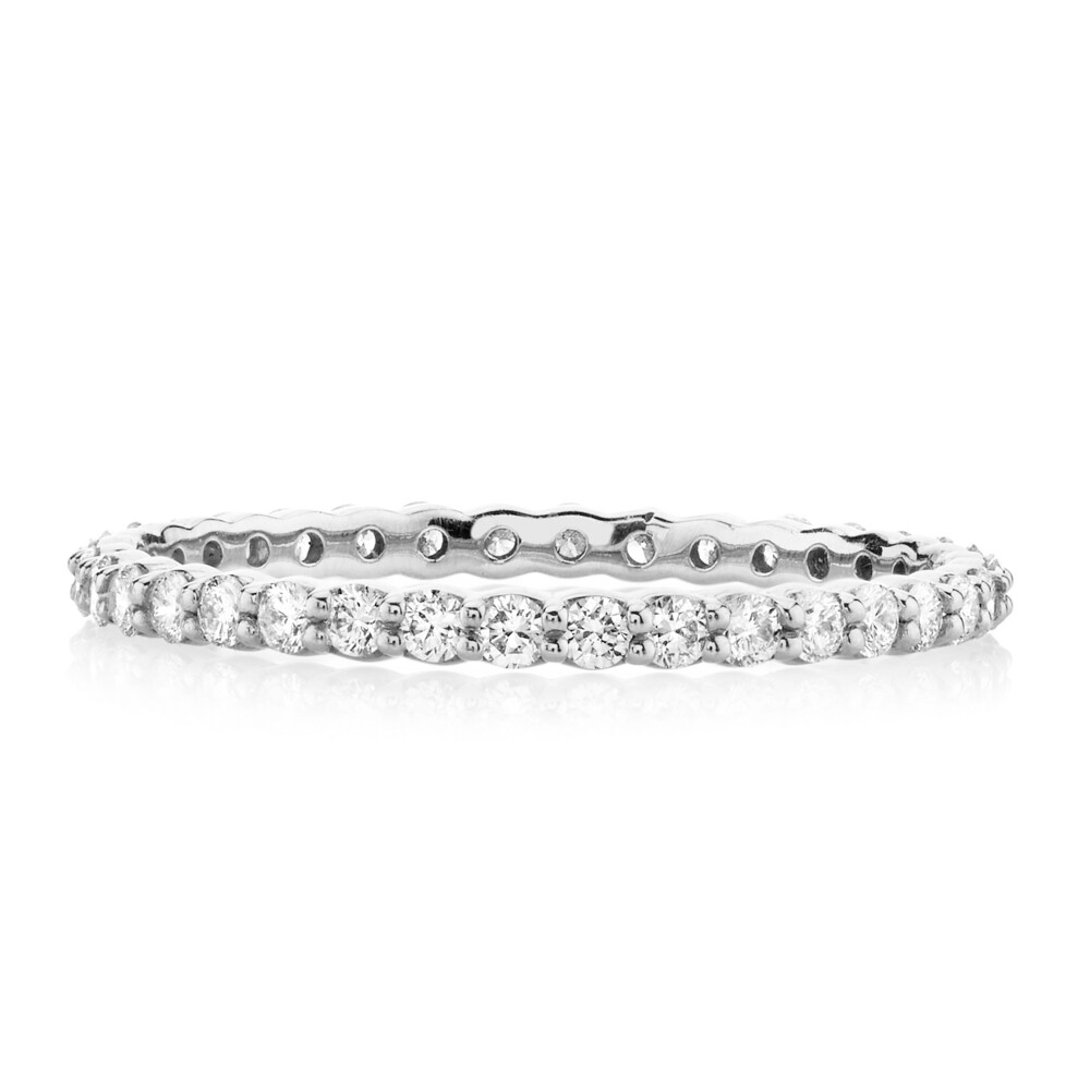 DELICATE AND SIMPLE SLOANE STREET WHITE DIAMOND ETERNITY BAND FEATURES A SIGNATURE BASKET SETTING WITH SHARED PRONGS IN 18K WHITE GOLD. THIS BAND IS A MUST-HAVE FOR AN EVERYDAY STACK WITH EACH DIAMOND MEASURING ABOUT 1.5MM. Pave Diamond Eternity Band