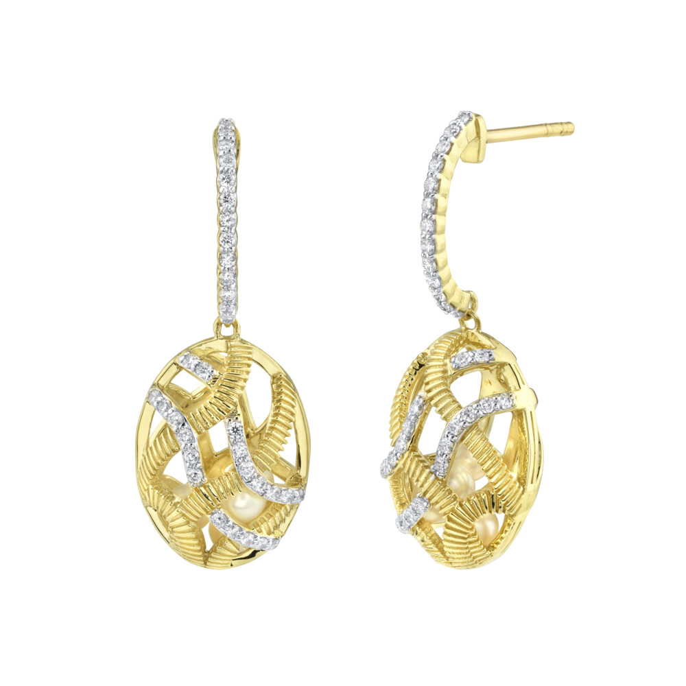 THESE FUN AND PLAYFUL PETITE SLOANE STREET CAGE EARRINGS FEATURE 80 LOOSE FRESHWATER WHITE PEARLS THAT BOUNCE WITH EVERY STEP. THE CAGE IS MADE UP OF INTERTWINING PAVE WHITE DIAMOND AND SIGNATURE STRIE RIBBONS IN 18K YELLOW GOLD WITH PAVE WHITE DIAMOND ILLUSION HOOP WITH POST AND LARGE BACKING CLOSURE. Diamond Cage Small Drop Earrings Filled With Seed Pearls