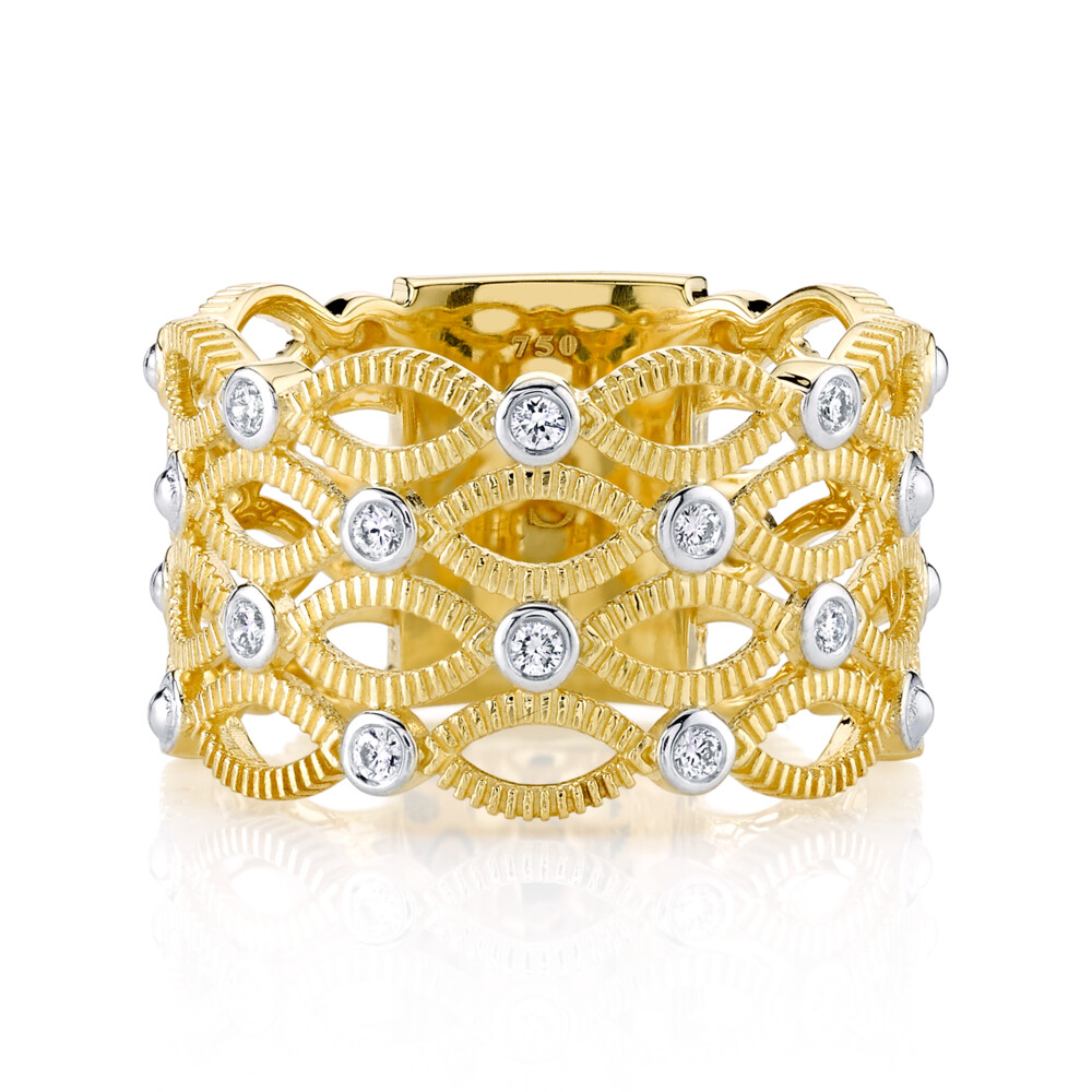 SLOANE STREET FOUR ROW OPEN MARQUISE STRIE BAND RING IN 18K YELLOW GOLD FEATURES SPARKLING BEZEL SET DIAMOND STATIONS AND ELONGATED ROWS OF SIGNATURE STRIE TEXTURED MARQUISE MOTIFS. THIS IMPACTFUL TWO-TONE BAND CREATES A BIG LOOK, WHILE THE AIR SPACE ALLOWS IT TO REMAIN FEMININE AND DELICATE. Marquis Band With Diamonds