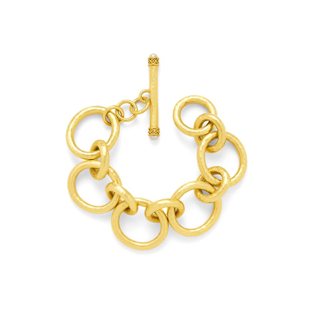 Lightly hammered links with a toggle decorated with freshwater pearls. Pearl. 24K gold plated over nickel free brass. Catalina Large Link Bracelet