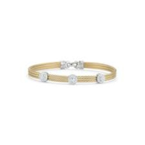 This heat treated yellow and grey colored bangle features three circle 18k white gold diamond stations. With a total carat weight of .08cts, this bangle is perfect to be stacked with others, or wear alone for a simple elegance. Two Toned Three Station Bangle