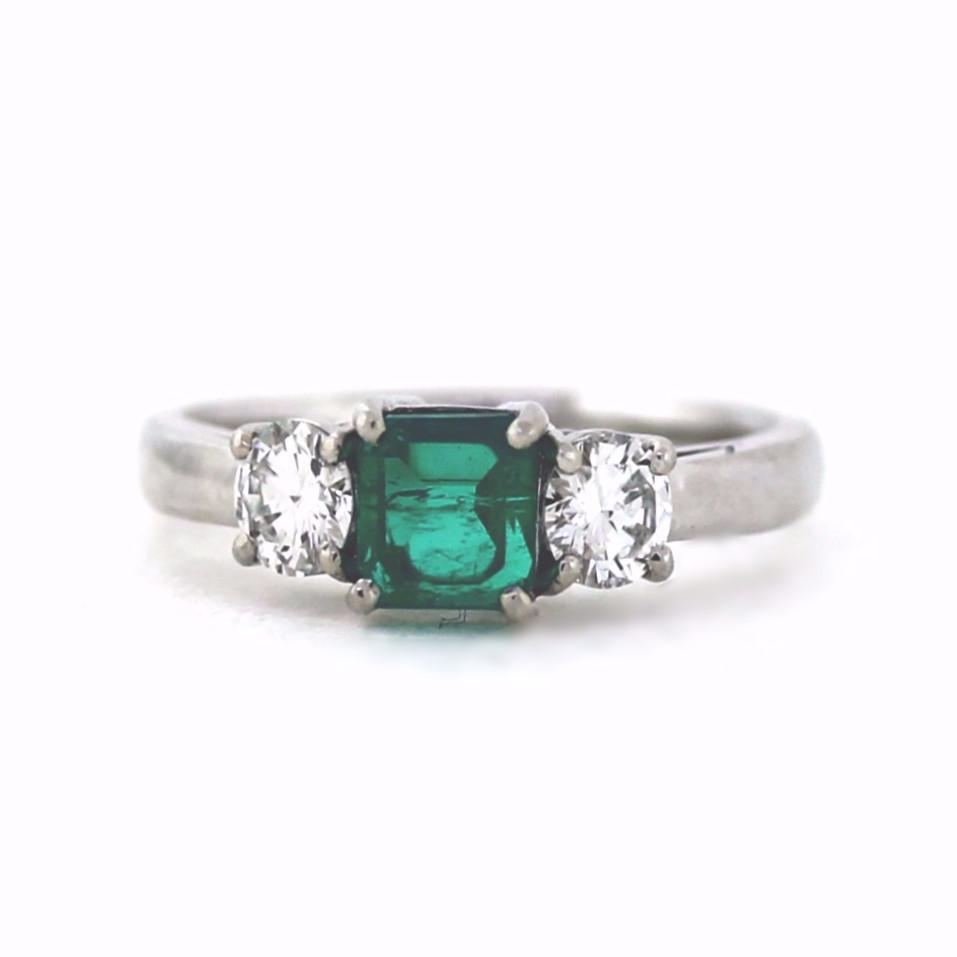 2 Round Brilliant = .901 Emerald = .75 Platinum Lady's Ring LR1888 Emerald Center with DIA accents ring