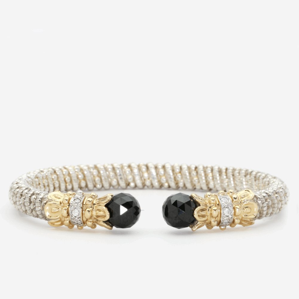 Ladies 14-karat yellow gold and sterling silver 4mm open style fashion bracelet with 0.07 carats of round diamonds and black onyx tips 14K Gold And Sterling Silver With Pave Diamonds