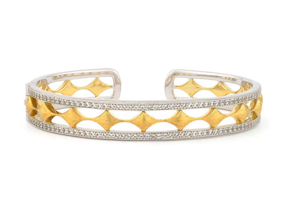The venetian kite cuff features round faceted white topaz stones pave set in sterling silver with white rhodium surrounding yellow gold vermeil kite motifs with the signature brushed jfj finish. Venetian Kite Gold Cuff