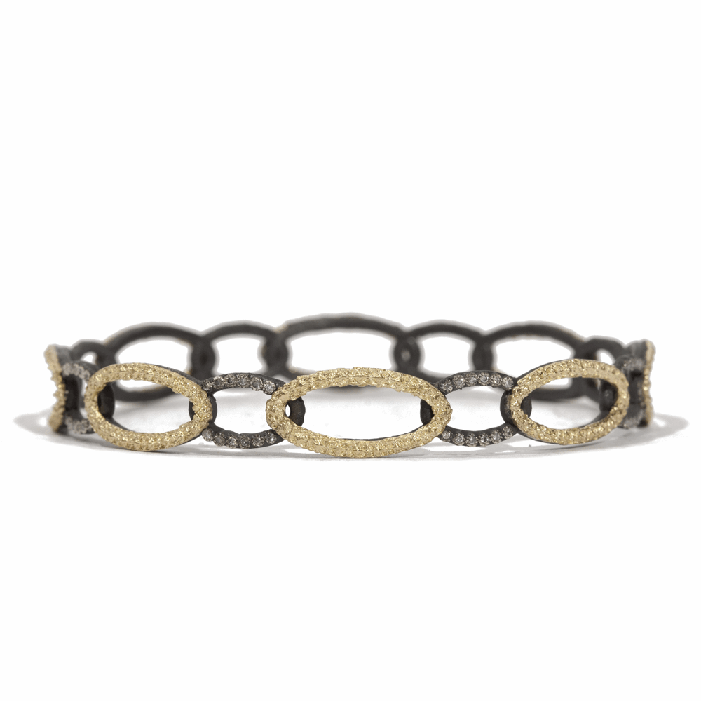 Blackened sterling silver and 18k yellow gold open circle-link bangle with white diamonds. Diamond Weight 0.384 ct. Open Circle Link Diamond Bangle