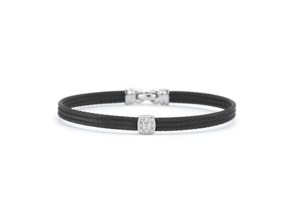 This heat treated black colored cable features 3 strands of cable displaying a single square diamond station. The setting made of 18k white gold, with a total weight of .05 carats. This simple bangle can be stacked with others, or just worn alone. Noir Single Squared Station Bangle