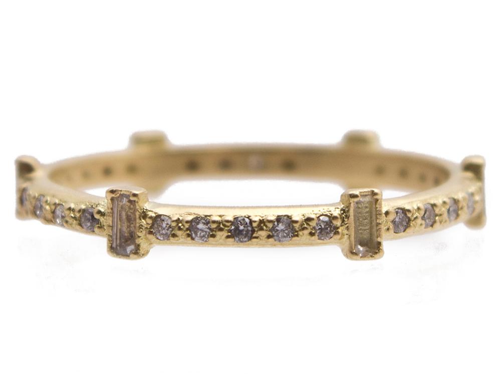 Collection: SuenoStyle #: 13537Description: Sueno 18k yellow gold 6-sapphire baguette stack ring with white diamonds and white sapphires. Diamond weight - 0.15 ct.Metal: 18k Yellow Gold 18k Yellow Gold Ring - 13537