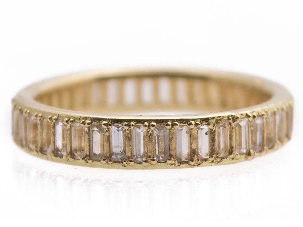Collection: SuenoStyle #: 13429Description: Sueno 18k yellow gold wide channel-set white sapphire baguette ring.Metal: 18k Yellow Gold 18k Yellow Gold Ring - 13429