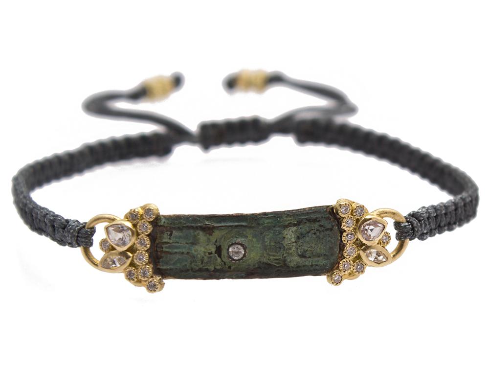 Collection: Sueno Style #: 10351 Description: Sueno 18K Yellow Gold artifact tab pull bracelet with white diamonds and white sapphires. Diamond Weight 0.11ct 18k Yellow Gold Bracelet - 10351