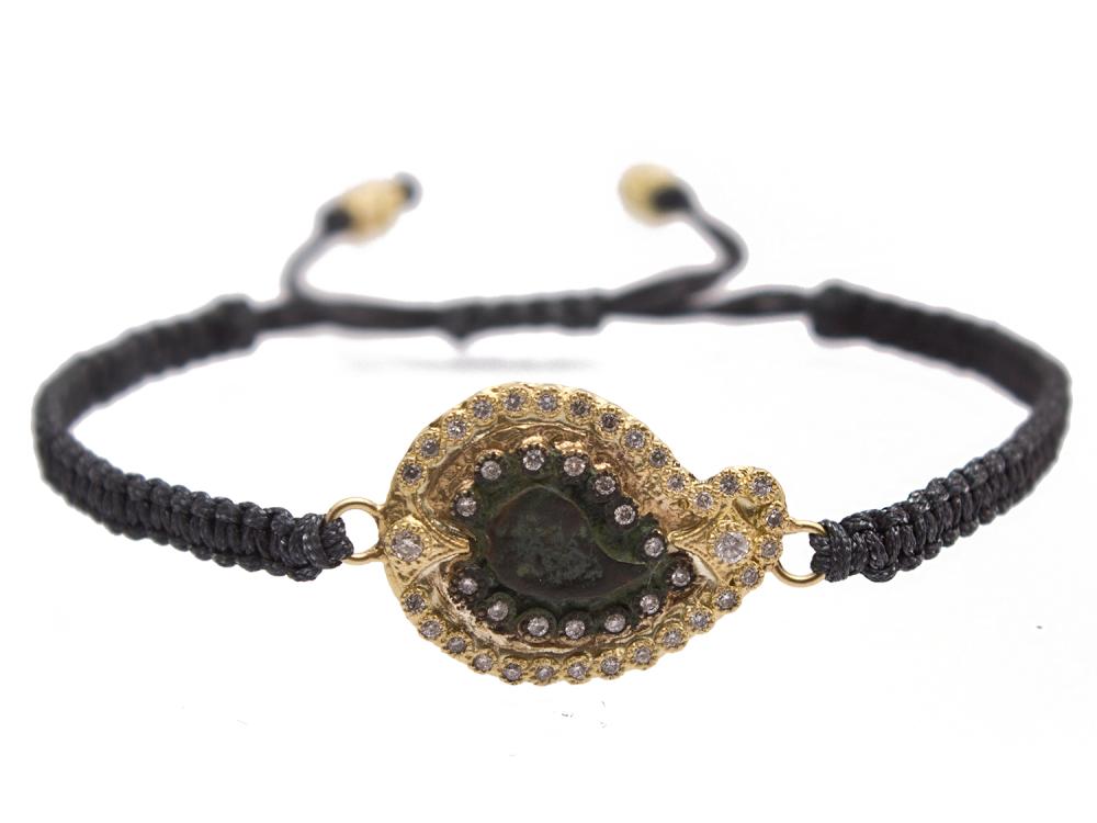 Collection: Sueno Style #: 10505 Description: Sueno 18K Yellow Gold paisley artifact pull bracelet with diamonds. Diamond Weight 0.26ct 18k Yellow Gold Bracelet - 10505