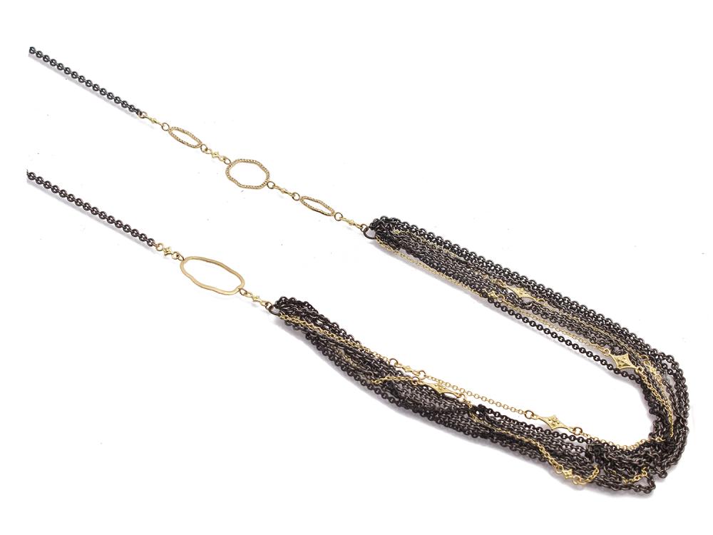 This Armenta Old World Collection features a blackened sterling silver chain with 18k yellow gold. This multi-chain bib necklace features champagne diamonds, and would be perfect for a day out! Champagne Diamond Necklace
