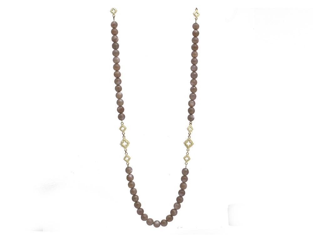 This Old World Collection by Armenta presents this long layering necklace. Displaying 8mm Brown Moonstone beads along with 18k yellow gold stations, this necklace is perfect for any outfit!
Brown Moonstone Beaded Necklace