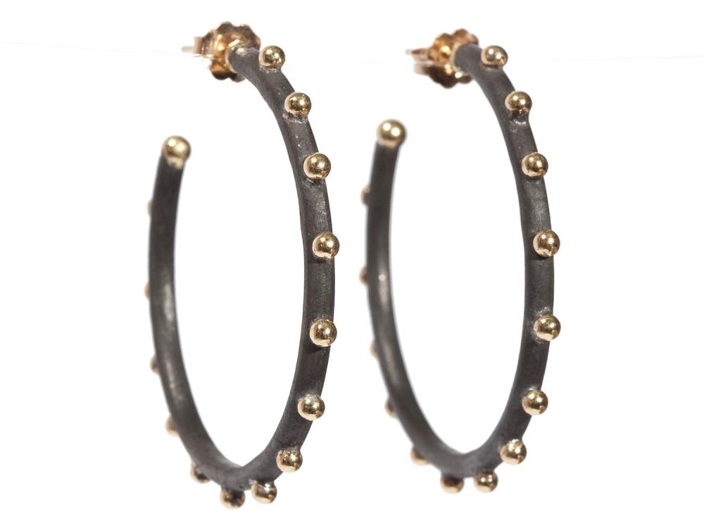 Collection: Old World Style #: 05183 Description: Blackened sterling silver and 18k yellow gold 35mm granulated hoop earrings on post.Metal: .925 Sterling SilverS/18k Yellow Gold Sterling Silver Earring - 05183