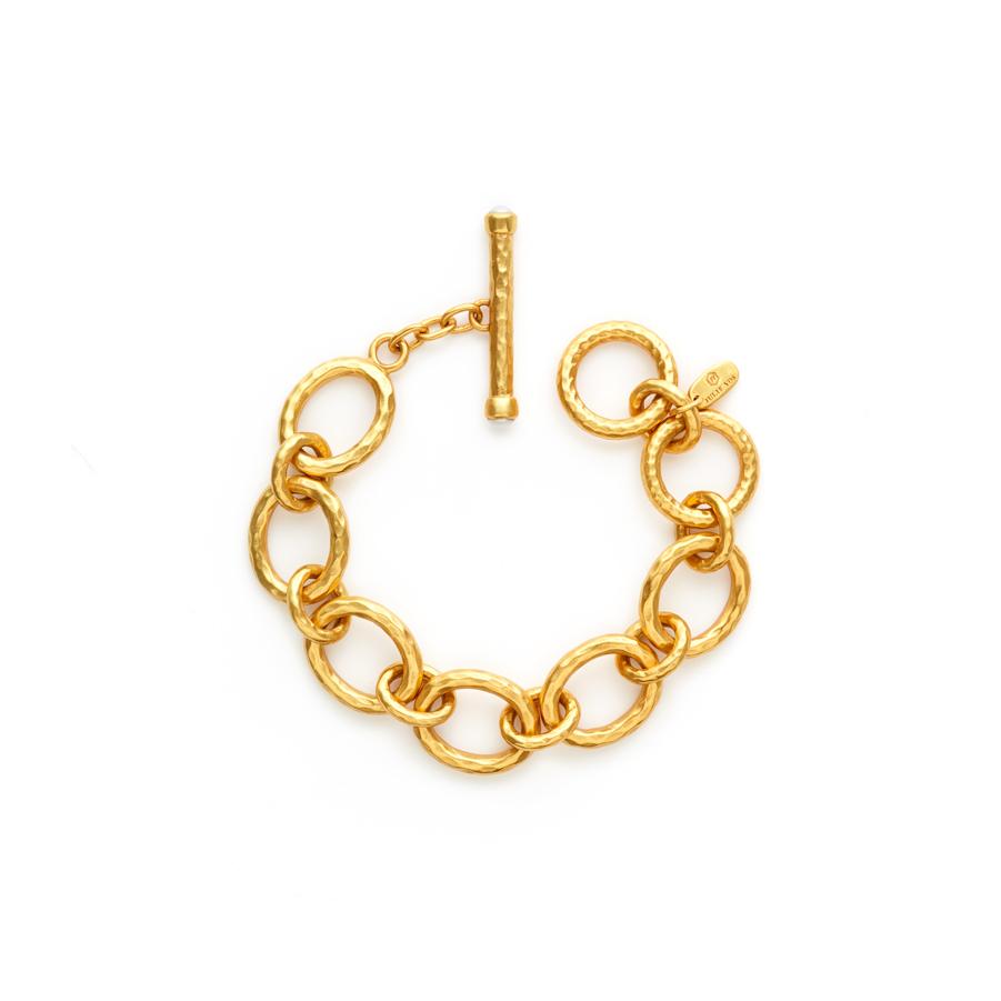 Our small Catalina Link Bracelet is made of up of links with a shimmering hammered 24k gold finish, and toggle is decorated with pearl endcaps. Shop now: Catalina Small Link Bracelet