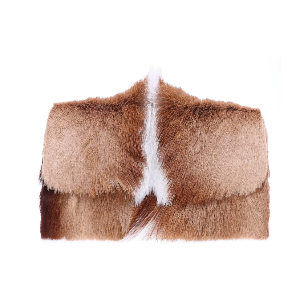This sleek and extremely unique natural springbok clutch is the perfect addition to any handbag lovers collection! Whether worn with the chain as a cross body bag or as a clutch, this bag is sure to turn heads. Large Natural Springbok Clutch