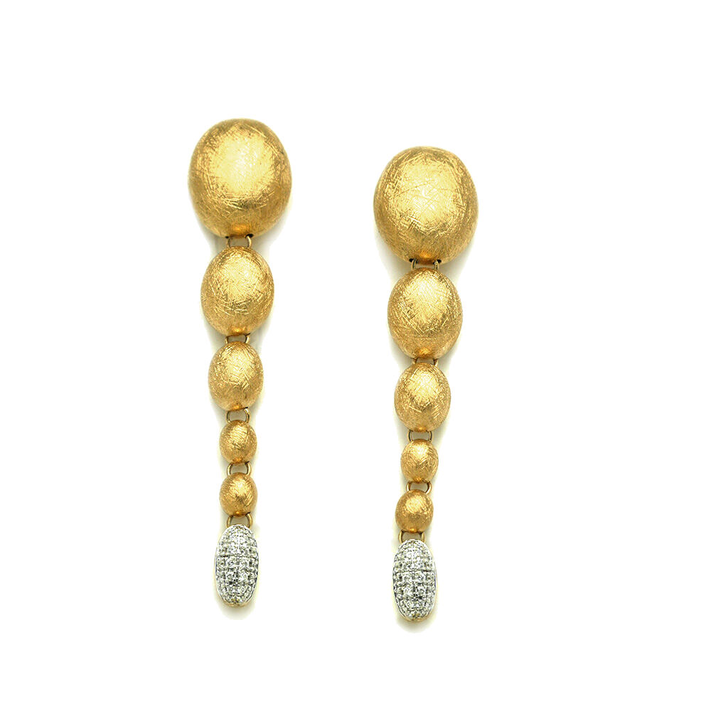 IVY earrings are made from 18kt gold and diamonds shaped into its elegant gold pearls, hand-engraved one by one with the very ancient burin technique and surprisingly light. Easy enough to wear every day. Ivy Diamond Drop Earrings