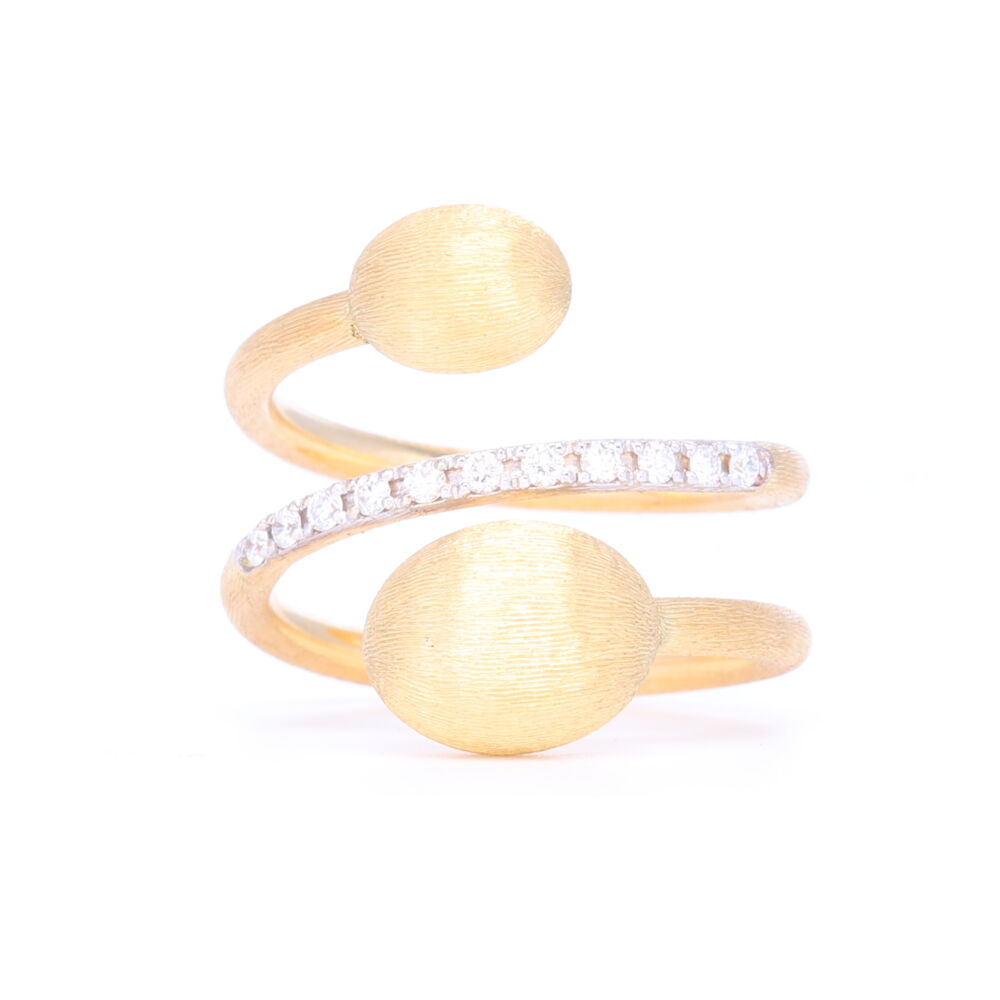 An ode to the kind of elegance that forces the rules and rewrites shapes and details with sophistication. A shiny diamond rivière embracing a 18kt yellow gold spiral, in a sinuous and sparkling dance. Made with 4.14 grams of 18k gold and .15 carats of diamonds.
Yellow Gold Spiral Dancing Ring with Diamonds