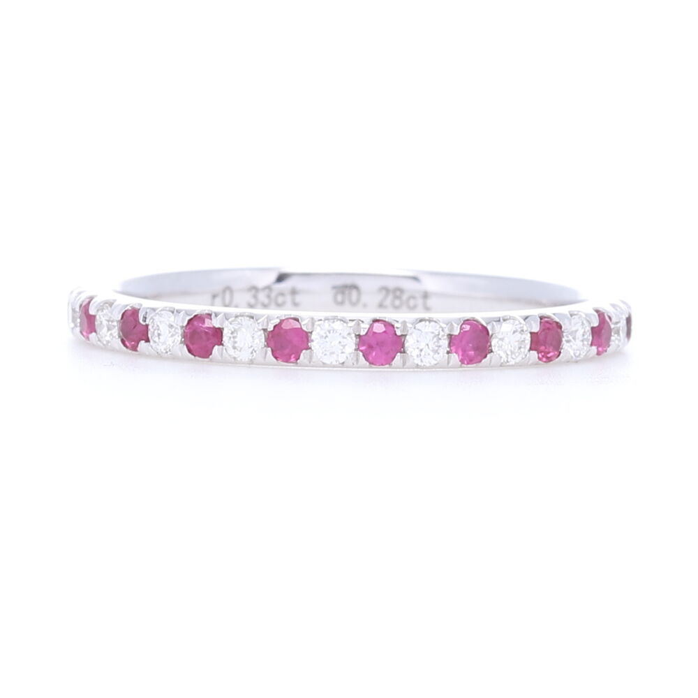 This 14k white gold round cut diamond and ruby shared prong stack ring is a nice way to add a touch of color to any ring stack. With .29 carats of diamonds and .33 carats of Ruby, this is a great way to symbolize a July birth date for yourself or family. Round Cut Diamond and Ruby Alternating Stack Ring