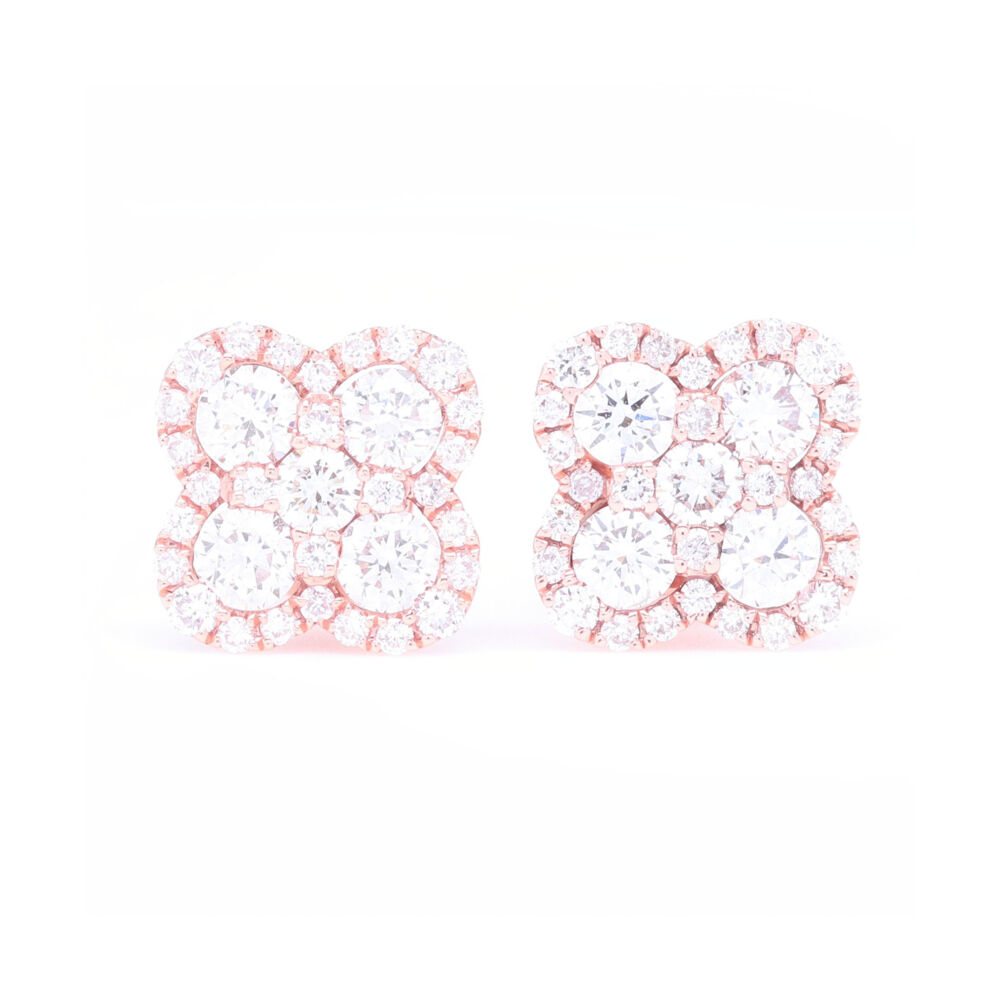 These darling little clover earrings pack a huge sparkle with 1 carat of diamonds, set in 14k rose gold these are perfect for wearing every day. Classic style that will never fade. 14k Rose Gold Pave Diamond Clover Stud Earrings