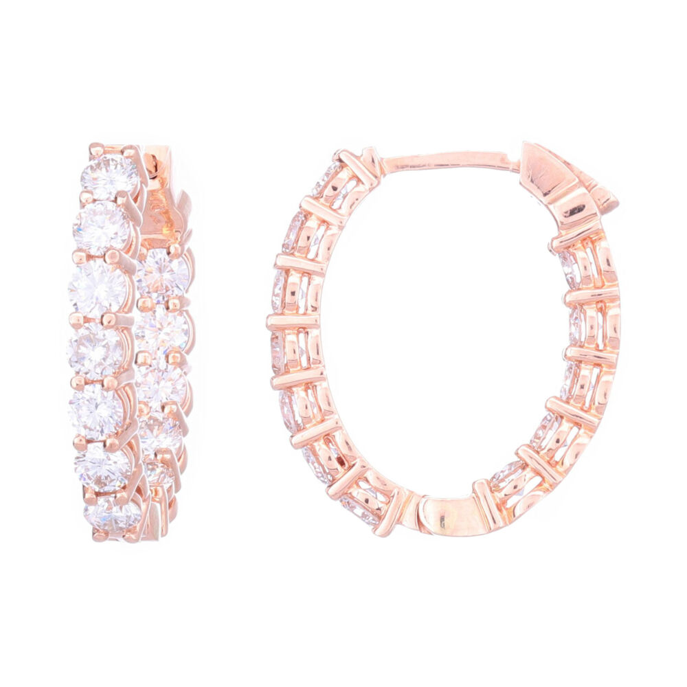 Wow - 3+ carats of diamonds prong set into soft color 14k rose gold. These inside outside hoops are set with SI 1 g/h color stones make these earrings so bright they can easily go from day to night. Comfortable, non snagging, won't get stuck in your hair, they will instantly be a favorite. Oval Shaped In & Out Hoop Brilliant Cut Diamond Earrings