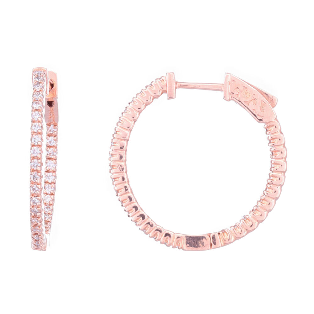 .5 carats of diamonds are set in these prong set 14k rose gold inside outside hoops. .8'' in diameter makes these a great every day earrings which have secure back click ins. 14k Rose Gold Round Diamond In & Out Huggie Hoop Earrings