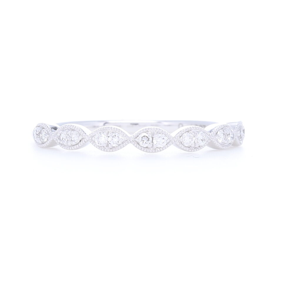 This 1/2 pattern marquise style swooping gold pattern ring has a total diamond weight of .13 carats. Adds dimension and a bit of negative space to most typical eternity rings. Marquis 1/2 pattern 2 Round Brilliant Prong Set Diamond Band
