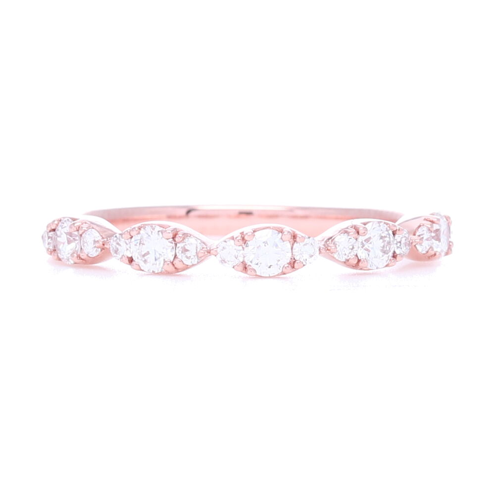 Alternating brilliant cut diamonds mimic the marquise look, in this stunning looking swooping marquise pattern. A great addition to any stack ring set. 32 carats of diamonds 14k Gold, Brilliant Diamonds in Marquise Prong Set Pattern Stack Ring