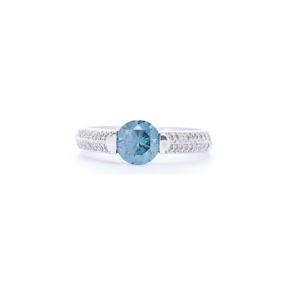 Pave knife edge ring perfectly frames a 0.86 diamond, flanked by an addition 1.09 carats of white diamonds and set in 14k white gold. This blue color is so unique, you'll find yourself educating others as to what type of stone is that, because everyone will want to know! 2 Row Prong Set Diamonds with Round Blue Diamond Center