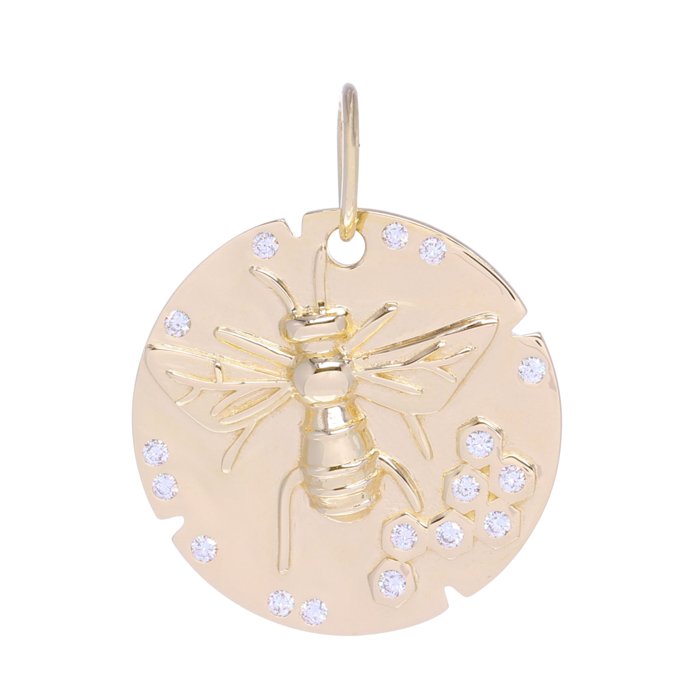 This Large 14k gold and diamond bee medallion charm is perfect for being a base layer in layering or being on it's own. It contains 6 g of 14k gold and .2 carats of diamonds. The irregular pattern of diamonds and small notches cut out from the side give this piece a truly unique look. This charm can fit on a chain up to 7mm in gauge but is often worn with one of the open-able ring chains. Stunning way to show affection for the most amazing creature on earth - bees! Large Gold Bee Medallion Pendant with Diamonds