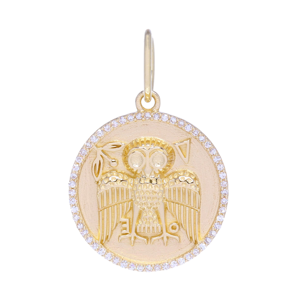This beautiful gold owl charm pendant is great for layering or it could be worn as a medallion all on it's own. It depicts an owl surrounded with diamonds. This charm has details, 0.14 carats of diamonds and 3.7 grams of 14k gold. It would be a nice addition to any chain or set of charms, because we all know, charms need friends. Gold Owl Medallion Pendant with Diamonds