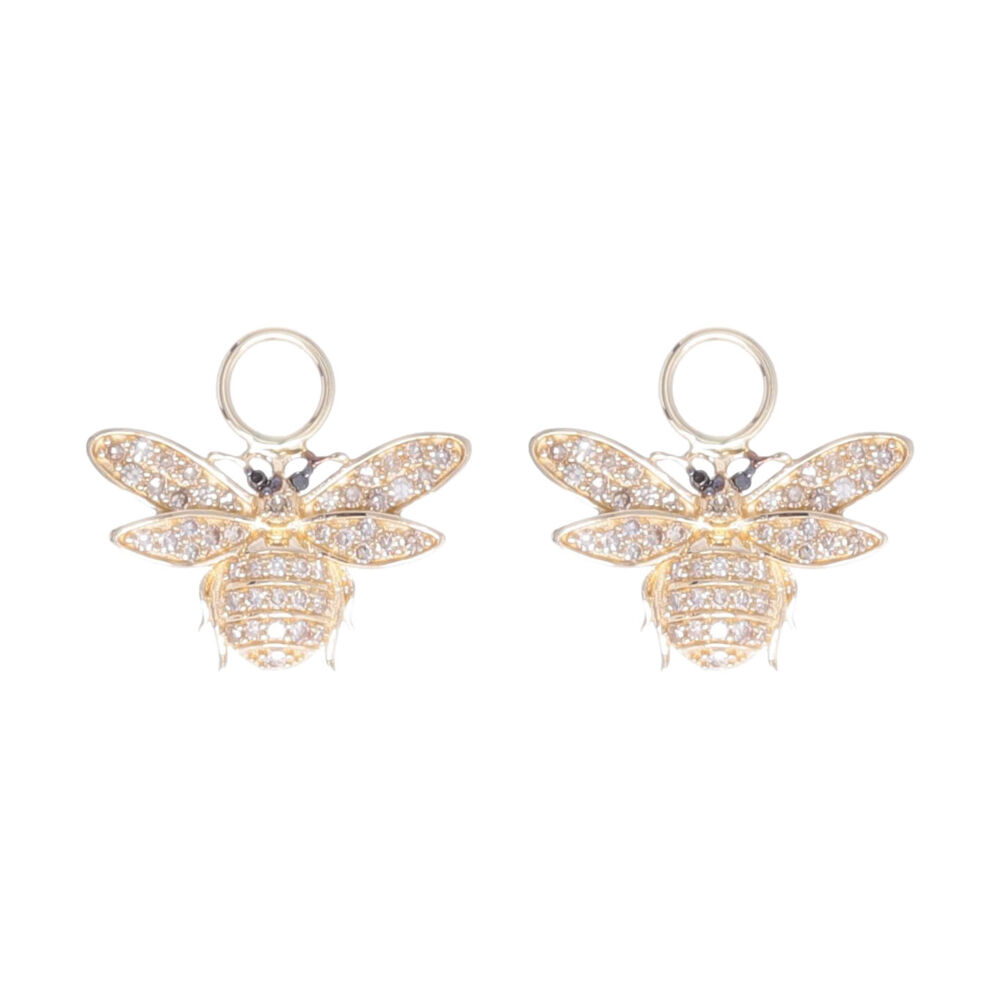These 14k yellow gold diamond bee earring charms are a must for bee lovers. These fun bee charms have .37 carats of pave set diamonds and are the perfect earring to jazz up any outfit. These charms can either be worn with a variety of hoop earrings or as a pendant. 14k Yellow Gold Diamond Small Bee Earring Charms