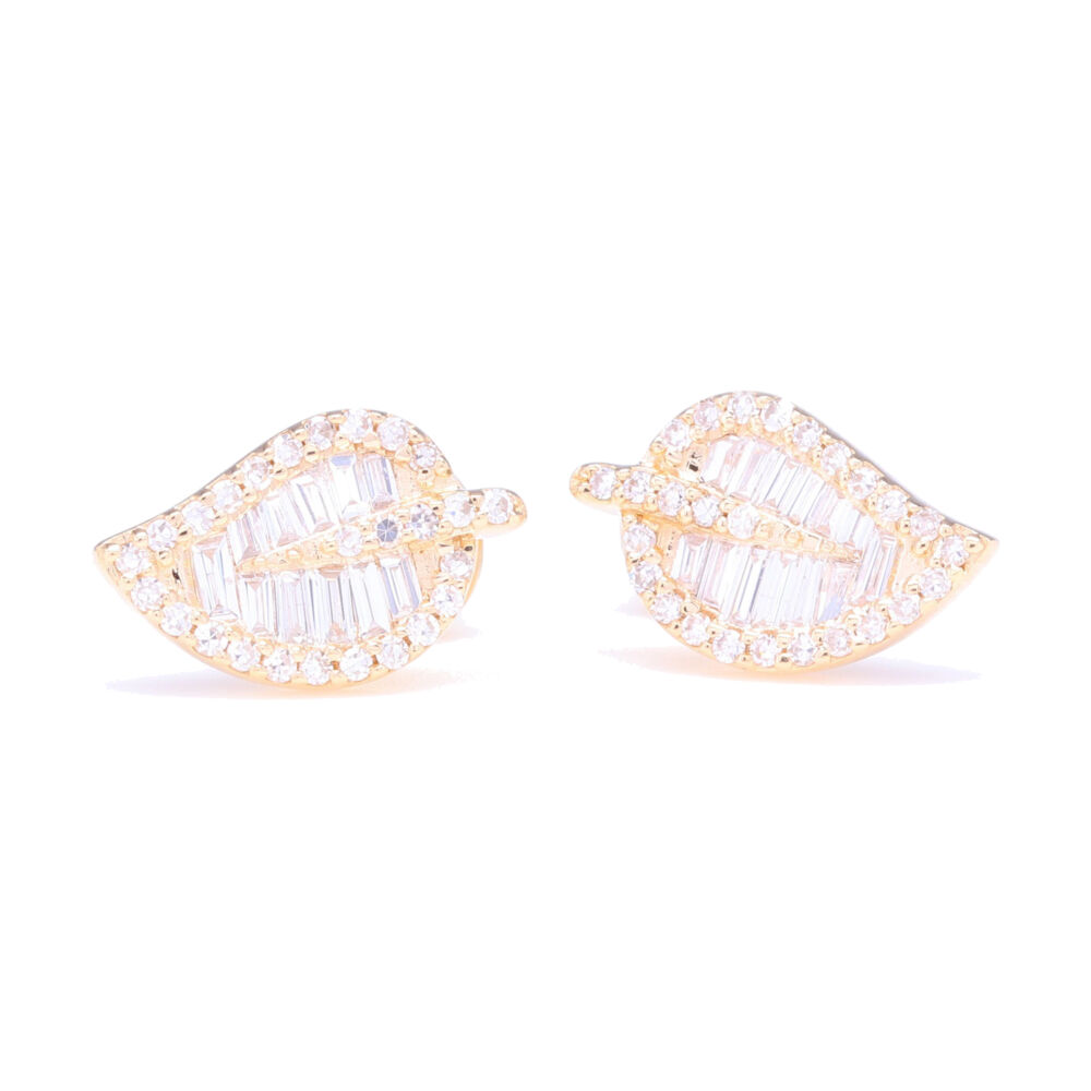 Super sexy and feminine, these step cut diamond leaf stud earrings are perfect for wearing as your primary earring or easily in a second piercing as well. Set in 14k yellow gold with .26 carats of eye clean diamonds - these botanical lovelies will soon grow on you! Baguette Diamond Leaf Stud Earrings