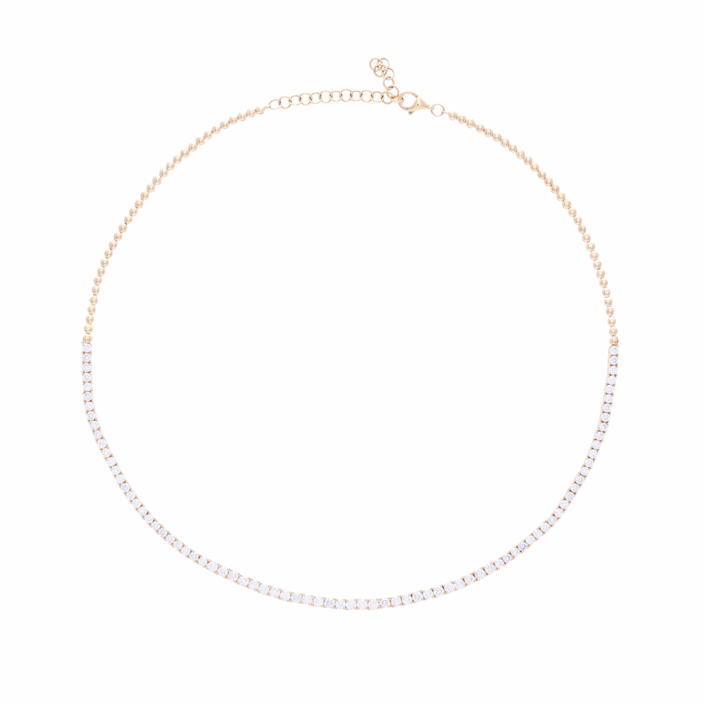 One of our favorite necklaces at LaNae - easy to wear casual or on a big night. This diamond choker with 4 carats of diamonds set into 14k yellow gold is a huge look. Wear up high and layer with other diamond station necklaces or wear on it's own for the big look that it is. You'll love wearing this with a simple t-shirt and jeans. Comfortable to wear, stays in place and doesn't roll. 4 Carat 1/2 Way Diamond Choker Necklace