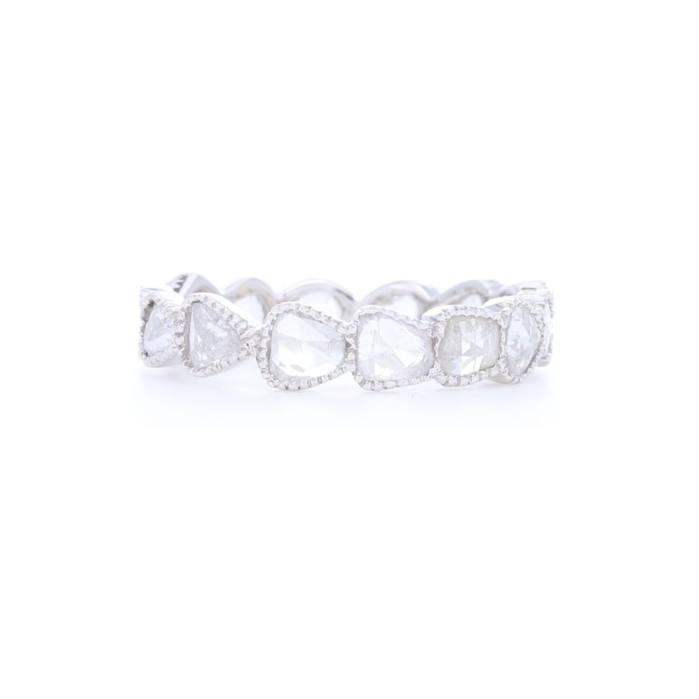 Rose cut diamonds bezel set in 18k white gold give this stack band such a unique look. Adds texture and negative space to any stack ring set. Contains 1.36 total carat weight of diamonds. "Maya" White Diamod Rose Cut Band in 18k White Gold
