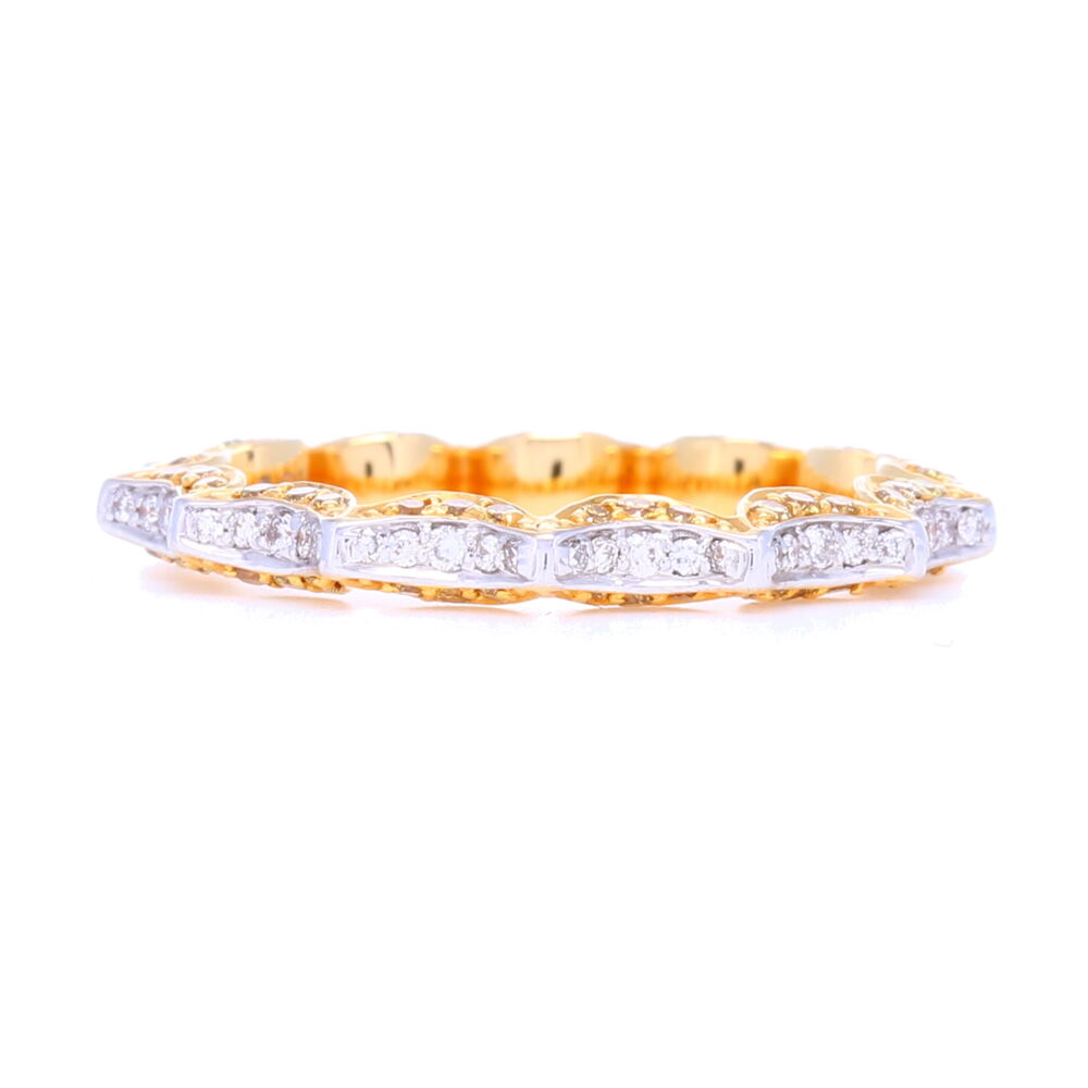 This uniquely designed "Taj" ring by Vivaan sets .74 carats of yellow and white diamonds in an 18k yellow and white gold swooping eternity ring pattern. One of the most unique eternity rings we carry, it adds stunning dimension to any stack ring set, yet is substantial enough to be worn alone.
2 Tone "Taj" Yellow & White Diamond band in 18k Yellow/White Gold