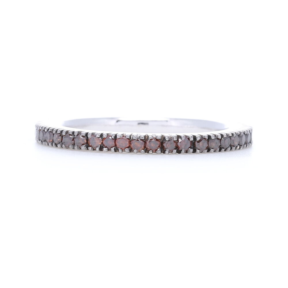 Looking for something really unique, this ring brings it. Matching orange diamonds are prong set into this 18k white gold in this eternity ring, add some wow to any stack! Round Cut Prong Set Orange Diamonds Set 18k White Gold