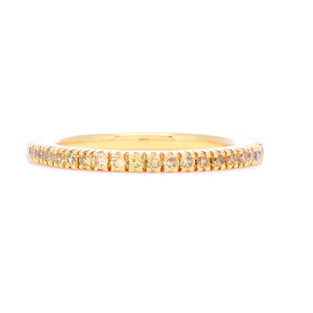 This isn't your ol' run of the mill stack ring, this feels substantial, luxurious and smooth as not to snag on clothing. The yellow diamonds in this ring are set in heavy 18k yellow gold. The diamond carat weight is ~.65. It feels as amazing as it looks. Yellow diamonds are so unique, it would be a great addition to any stack ring set. Brilliant Cut Yellow Diamond Yellow Gold Prong Set Band in 18k