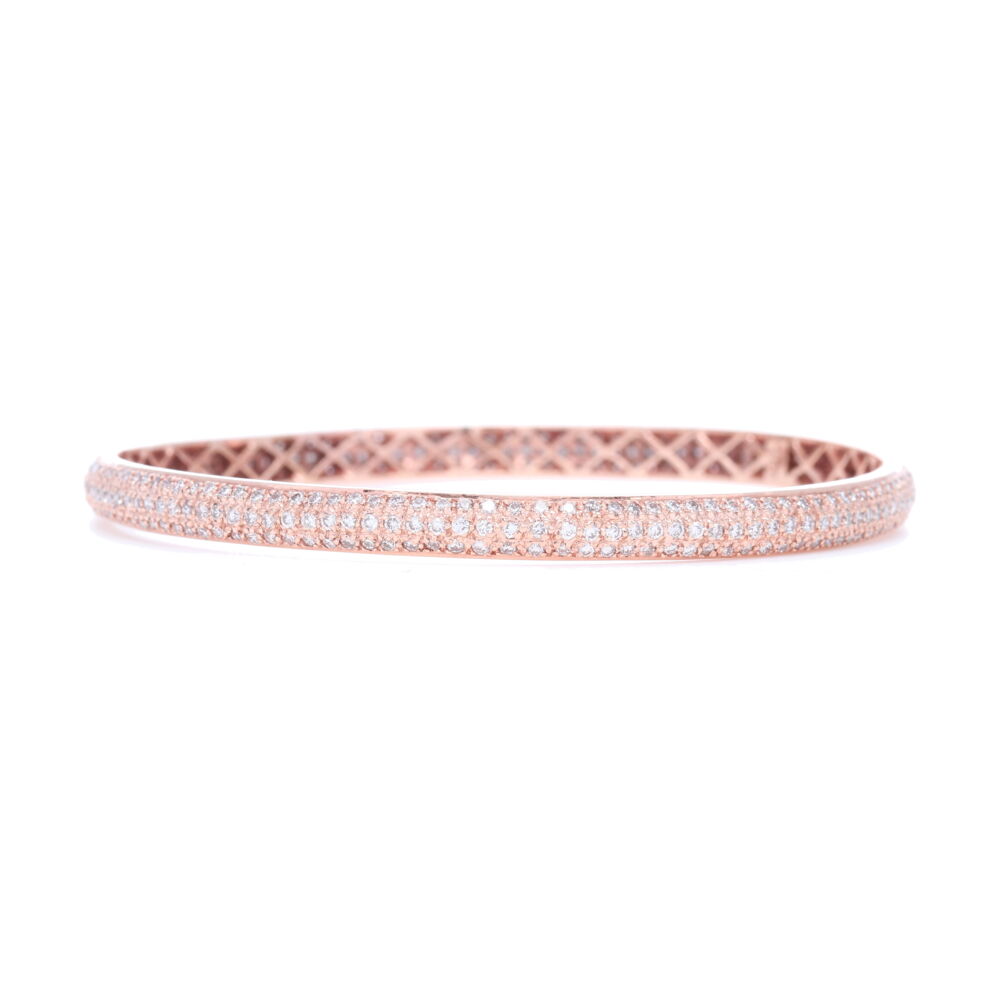 4.37 carats of diamonds set into 17.3 grams of 18k white gold covered in Pink Rhodium make this bracelet beyond wow. Such a special piece of arm candy that's heirloom quality. Check out all the other Tyre bracelets we have to stack them up. Tyre Bangle Bracelet with White Diamonds Set in 18k White Gold (Pink Rhodium)