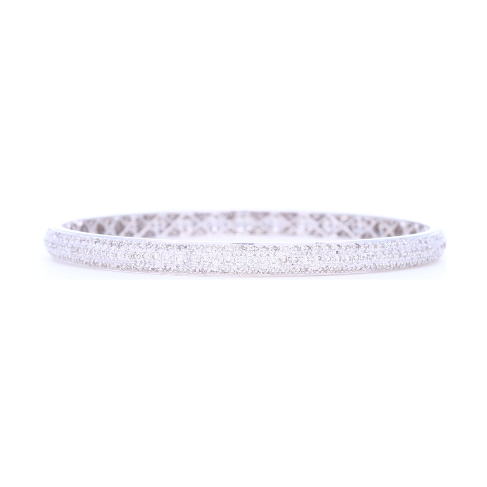 4.27 carats of white diamonds set into 17.5 g of 18k white gold would make anyone swoon for this arm candy. Everyone knows bracelets need friends, check out the other colors. Tyre Bangle Bracelet set with White Diamonds in 18k White Gold