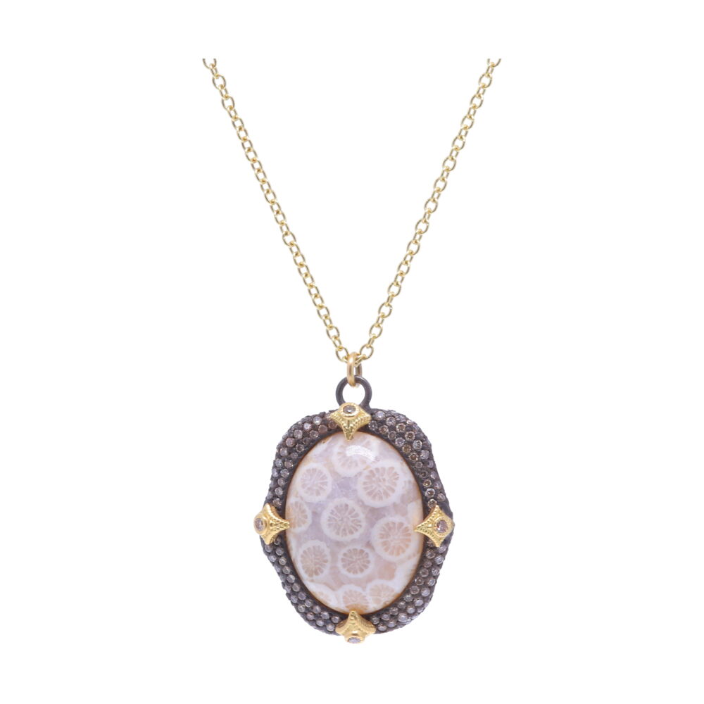 This Old World Collection necklace brought to you by Armenta features a large fossilized piece of coral as a center oval set stone. Surrounded by a halo of white and champagne diamonds with 4 yellow gold prongs. Fossilized Coral Necklace