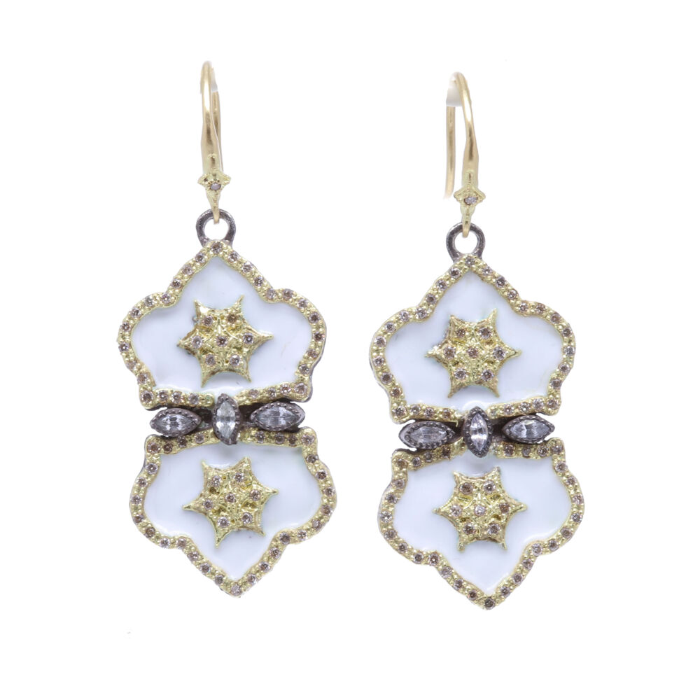 These earrings brought to you by Armenta and their Old World Collection, features 18k yellow gold and blackened silver. These earrings display white enamel on the double padlock drop earrings, accented with champagne diamonds. White Double Padlock Earrings