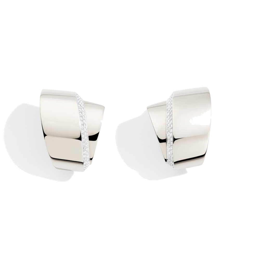 Earclips in 18K white gold and diamonds. Diamonds 78, ct. 0,68. Diamond quality DEF, IF to VVS.
Product SKU: PG0527B 370
Featuring the same design as the Tourbillon ring, these earrings, composed of two large bands in white gold, one of which is trimmed in magnificent diamonds, overlap to create a dynamic shape. The clip style accentuates their easy wearability. 18k White Gold and Diamond Tourbillon Earrings
