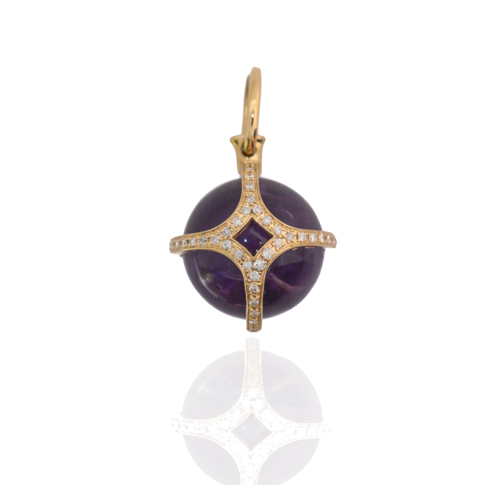 This 18k yellow gold pendant features a solid 21ct amethyst orb encased in a gold cage set with 77 diamonds weighing 0.62ct. Pools of Light Pendant - Amethyst 18k