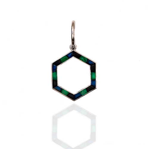 This white gold hexagonal pendant features calibree cut emeralds, onyx and sapphires. Inspiration for this pendant was derived from Art Deco target designs.
Deco Hexa in Emerald, Onyx, and Sapphire