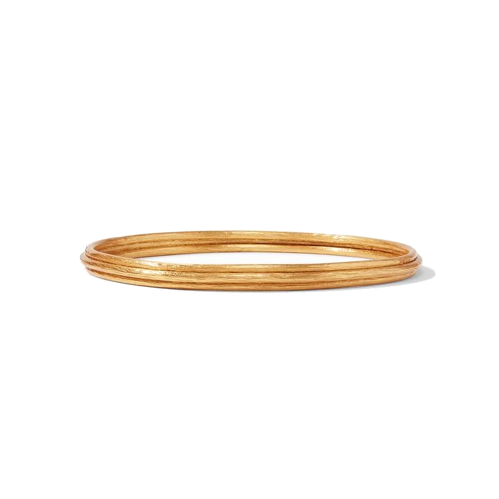 Simple and chic, this 24k plate bracelet will go with anything in your closet! Barcelona Bangle