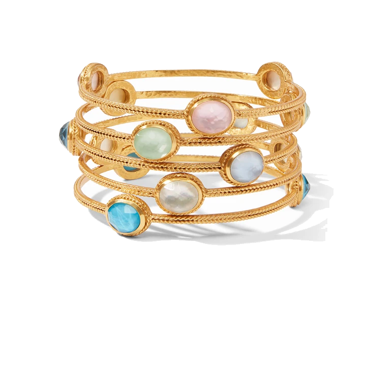 Stunning 24 k plate three stone bracelet. Stack more than one of these bangles to really make a statement. Calypso Bangle
