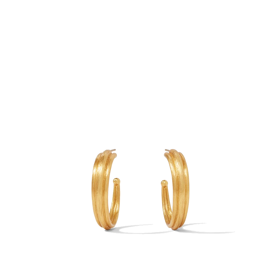 Elegantly scored hoop in a richly burnished gold.
Model is wearing a medium. Barcelona Hoop Gold