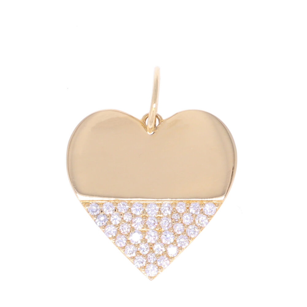 This 14k yellow gold heart pendant looks as if it has been dipped in sparkling diamonds. Perfect on its own or marry it with others to create a unique look that only you have. <div><br></div><div><ul><li>Handcrafted of 14k Gold</li><li>0.45tcw of Diamond</li></ul></div> 14k Heart Dipped in Diamonds