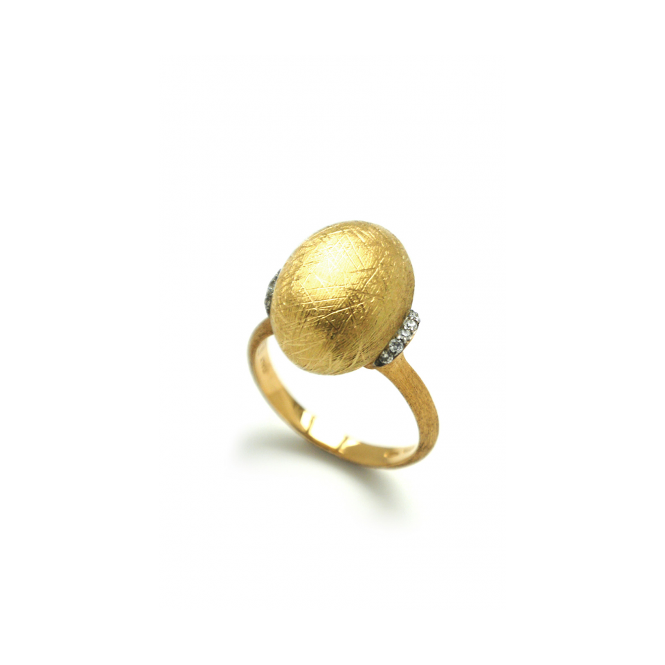 This 18k yellow gold ring features a large bead of brushed gold with two diamond stations on either side. This is perfect for everyday wear and will compliment any outfit. Dancing in the Rain Large Bead Ring