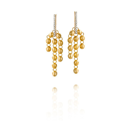 These stunning chandelier like earrings, feature three different length chains, with an 18k yellow gold brushed finish on gold beads. The stud of these earrings display a bar of diamonds falling down to the dangle of the earring. Dancing in the Rain Dangle Earrings